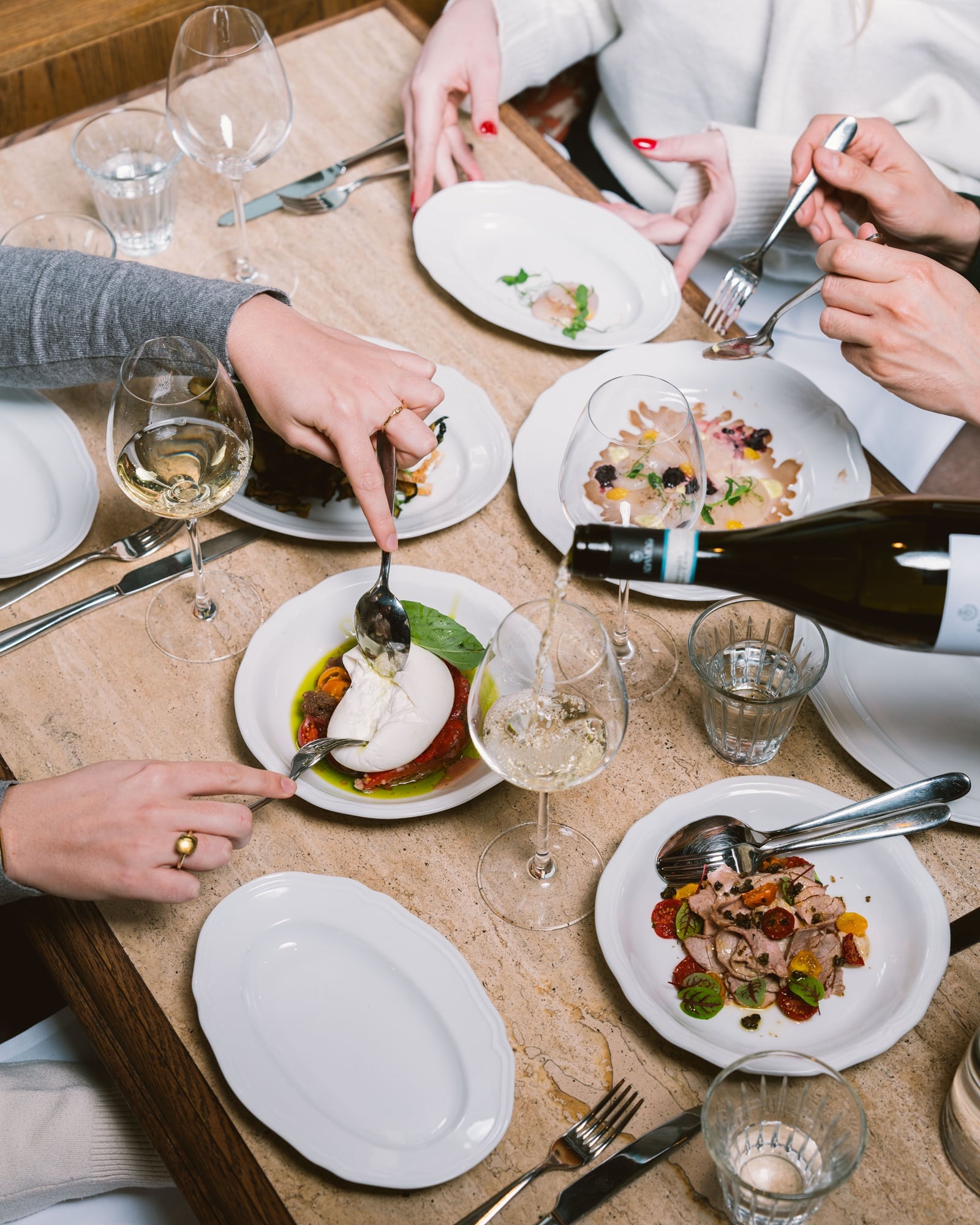 Trattoria Grazialla - table in restaurant with Italian dishes